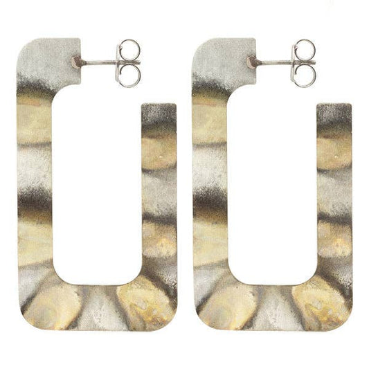 Pair of earrings with abstract pattern on a white background