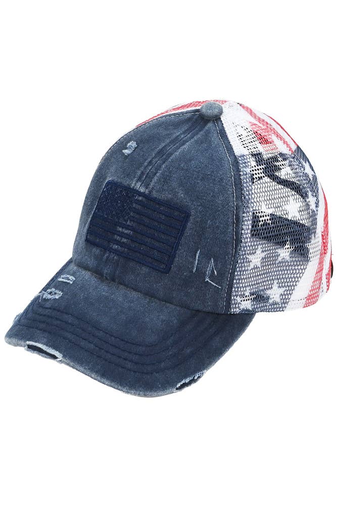 Blue distressed baseball cap with American flag design on a white background