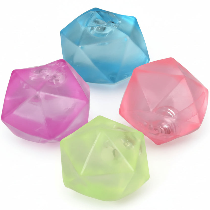 Four colorful polyhedral dice on a white background with 'Curious Minds Busy Bags' branding.