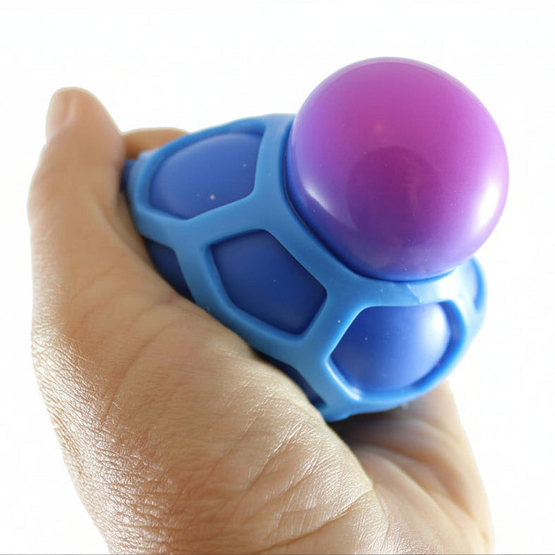 Blue and purple fidget spinner held in a hand with 'Curious Minds' branding.