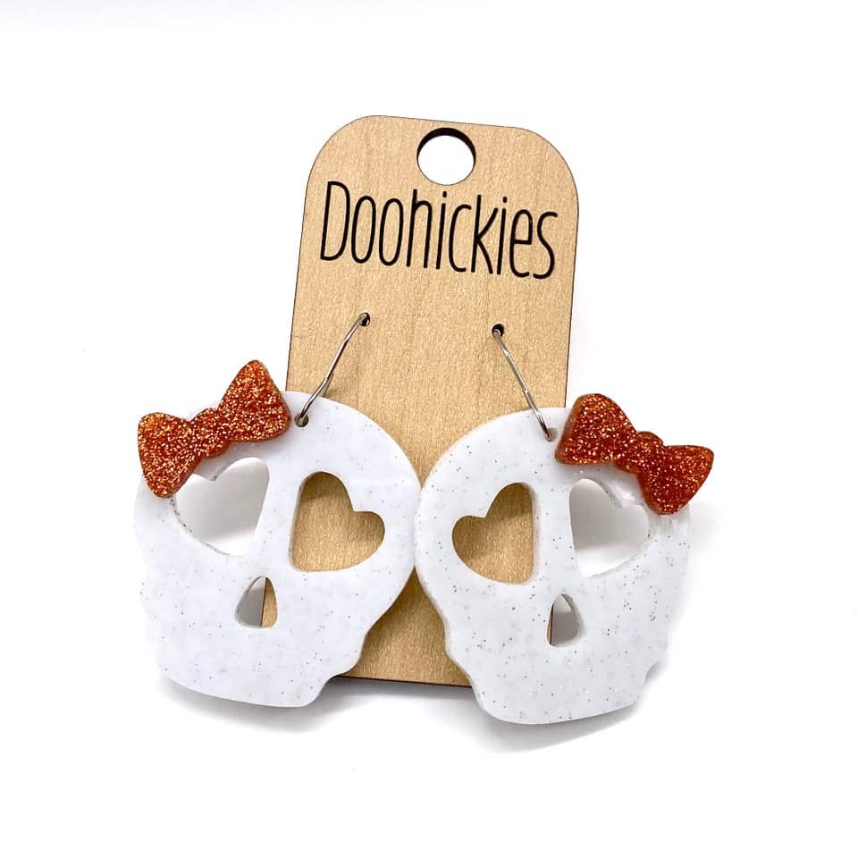 Glittery Skull with Orange Glitter Bows Acrylic Dangles - Halloween Earrings