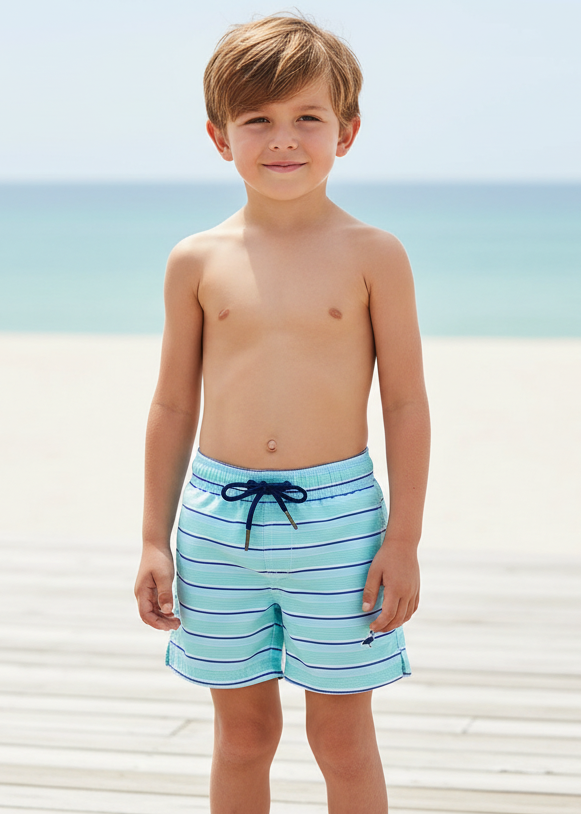 A pair of boys' swim trunk shorts with horizontal blue and white stripes, featuring a drawstring waist and a small bird graphic on the left leg.