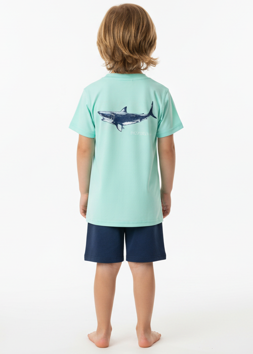Child wearing a light blue t-shirt with a shark design on the back, standing against a white background.