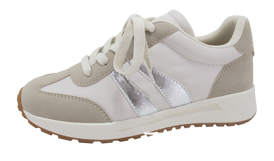 A low-top sneaker in white and light beige suede with metallic silver side stripes, white laces, and a white midsole with a brown outsole.