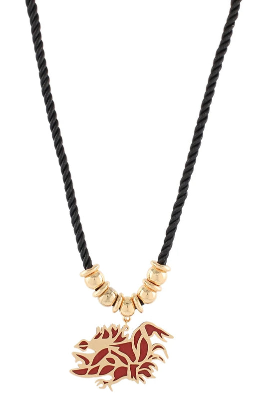 A black twisted cord necklace featuring gold-toned beads and a red and gold rooster pendant, shown against a plain white background.