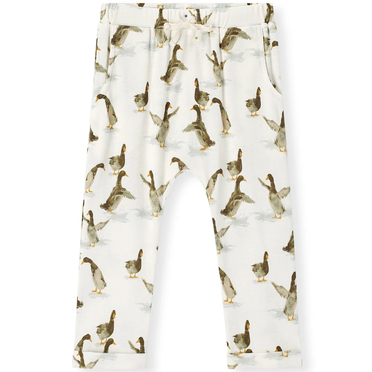 White children's pants with an all-over print of walking ducks in brown, gray, and orange, shown flat against a white background.