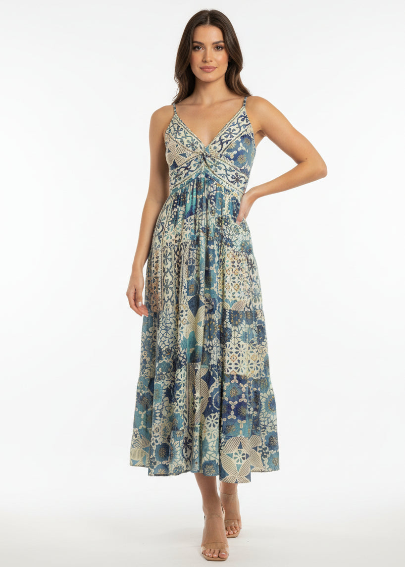 Floral patterned dress hanging on a white door