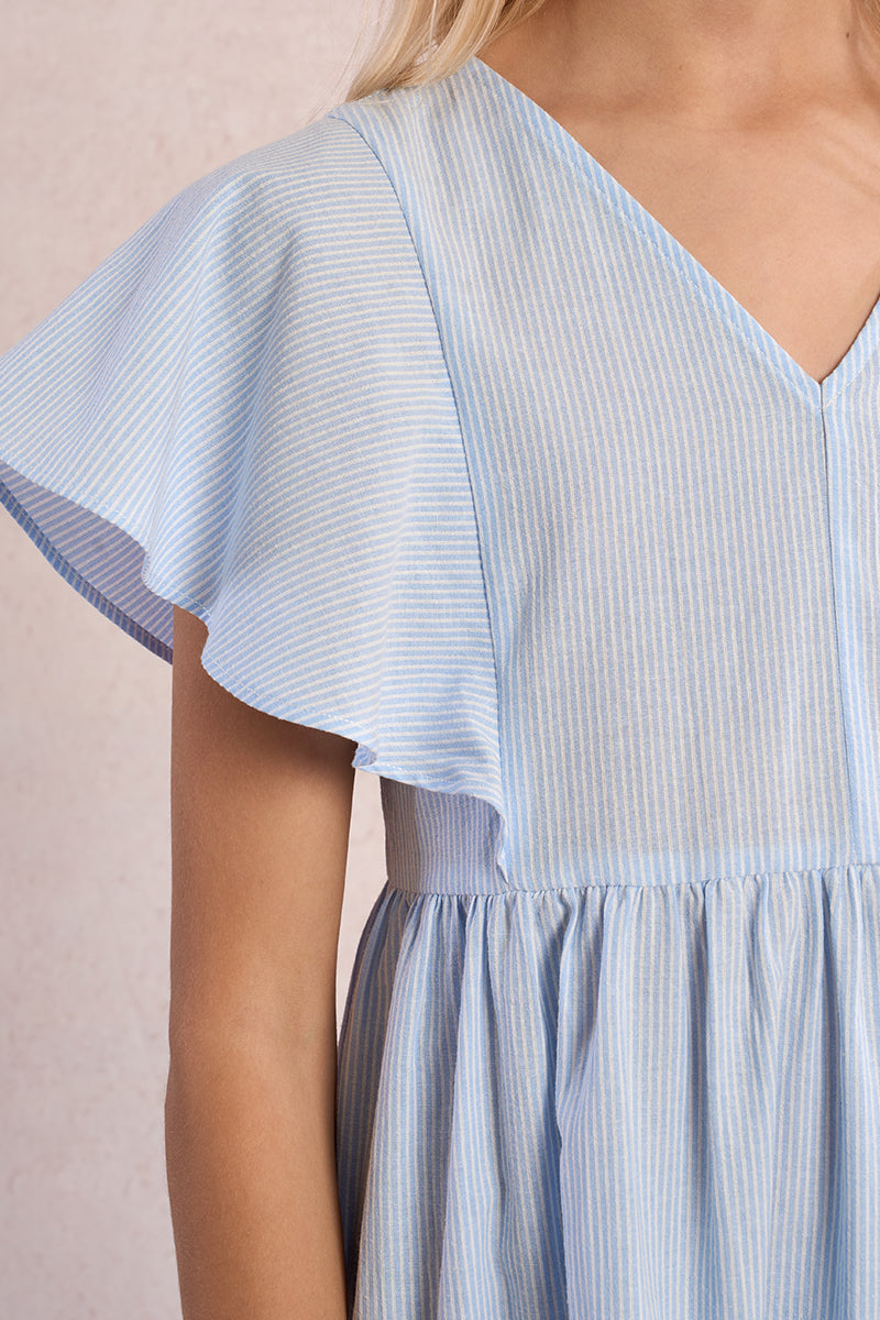 Light blue striped dress with ruffled sleeves on a neutral background