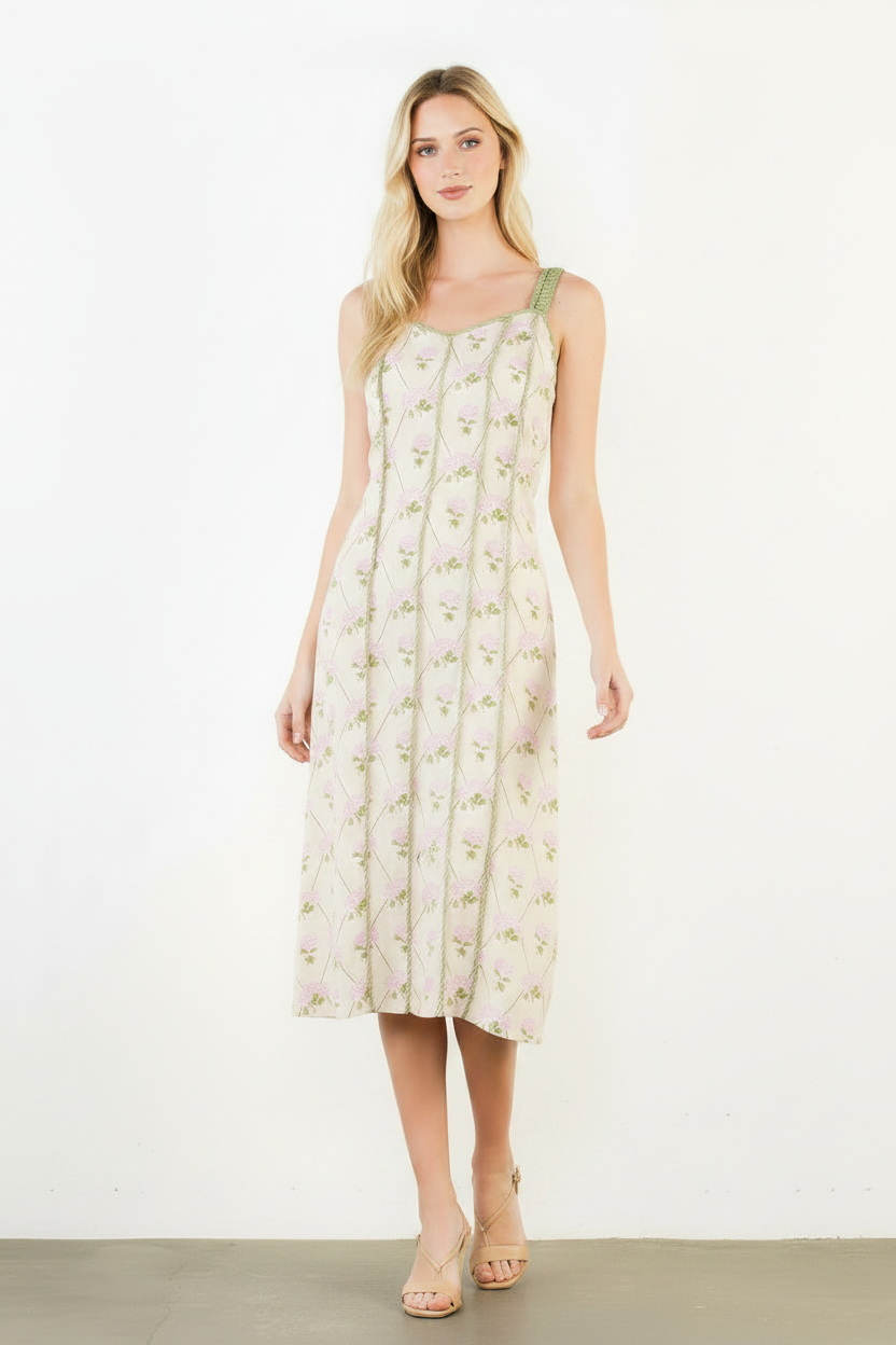 Woman wearing a floral dress on a white background