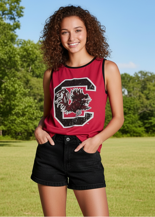 Woman wearing a red tank top with a logo on a beige background