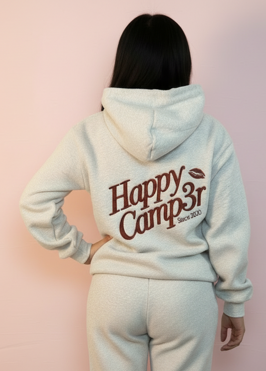 Light gray hoodie and pants with 'Happy Camp3r' text and red graphics on a white background
