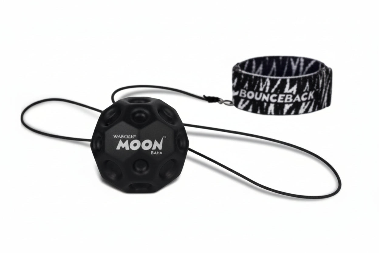 Black camera with 'MOON' branding and a black and white patterned lanyard on a white background.