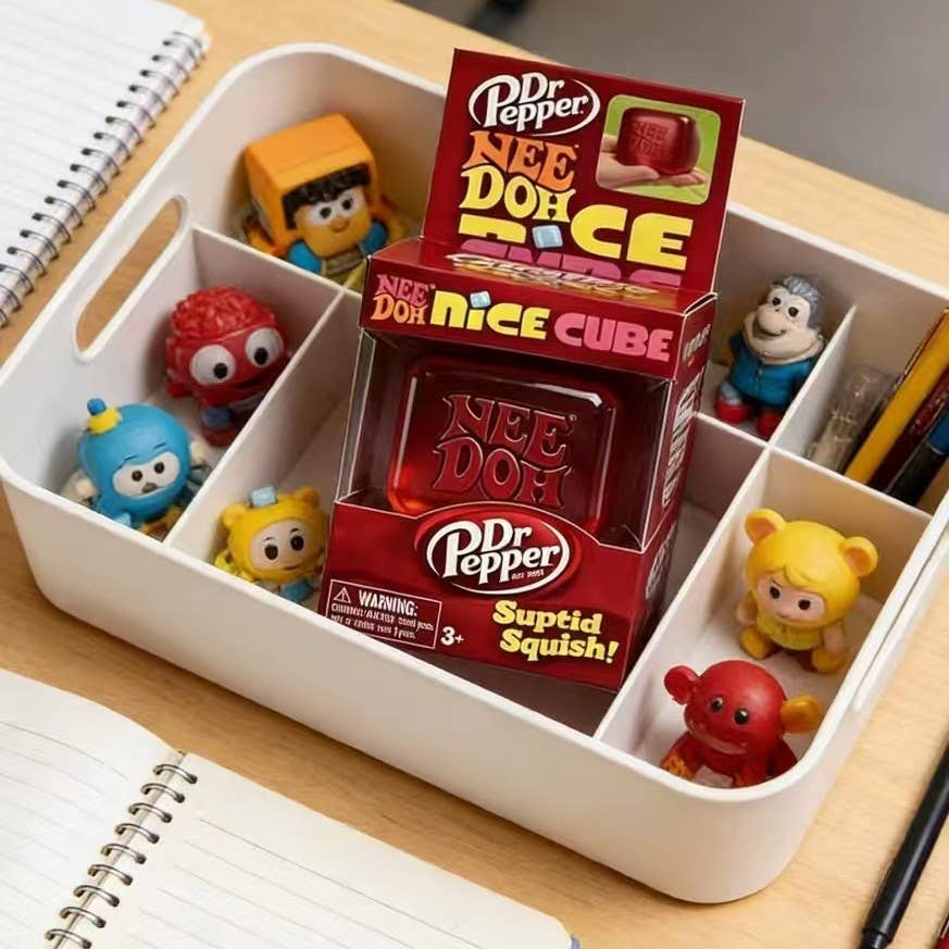 Dr Pepper Nee Doh Nice Cube packaging with small figurines in a compartmentalized container.