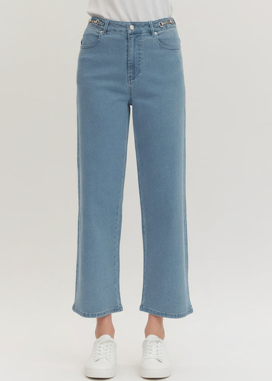 Light blue jeans on a plain background