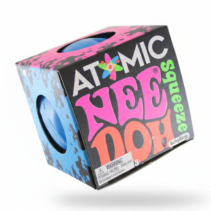 Hand holding a colorful box labeled 'Atomic Nee Doh Squeeze' with 'Curious Minds' branding.