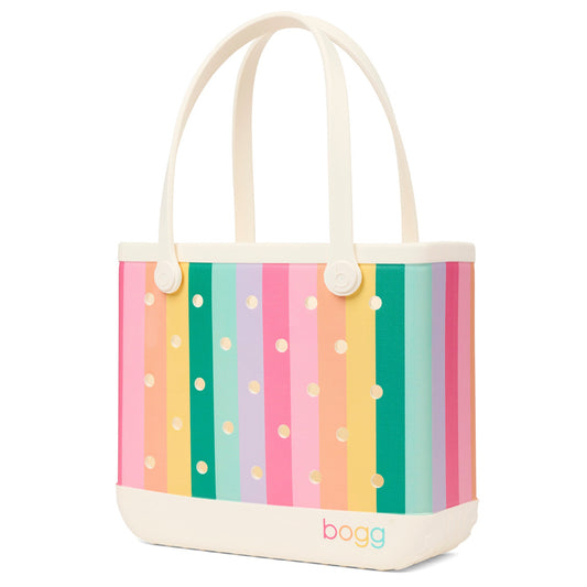Colorful striped Bogg bag with polka dots on a white background